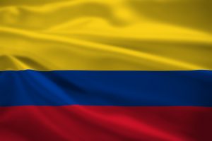 Colombia flag blowing in the wind Colombia flag blowing in the wind. Background texture.